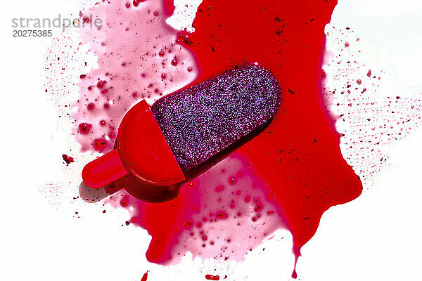 Berry popsicle staining white background