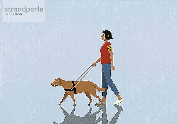 Blinde Frau geht mit Blindenhund spazieren