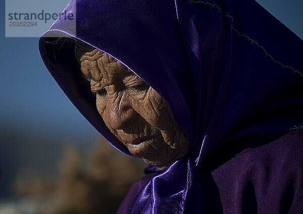 An elderly pilgrim attends a ritual during Nino Fidencio celebrations in Espinazo  Nuevo Leon state  Mexico