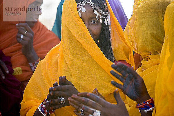 Shanabla woman sings at a wedding celebration near El Obeid  North Kordofan  Sudan. A nomadic tribe they raise camels.