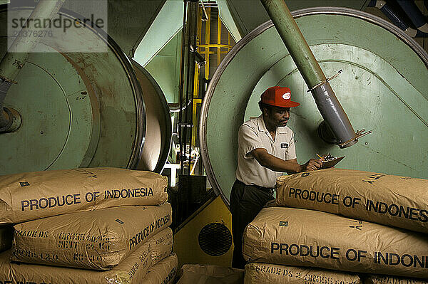 Worker in a coffee factory.