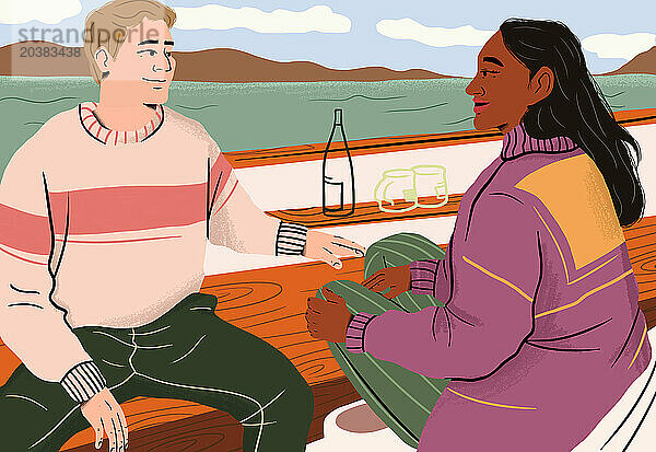 Couple talking and sitting in yacht