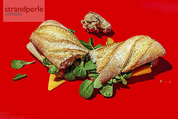 Cheddar cheese sandwich on red background