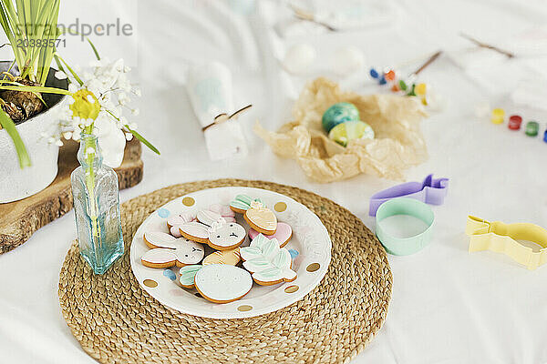 Easter cookies and decorations on table