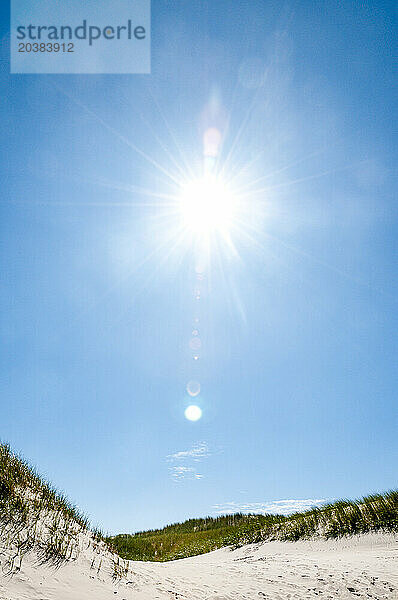 Germany  Schleswig-Holstein  Amrum  Sun shining over sandy beach