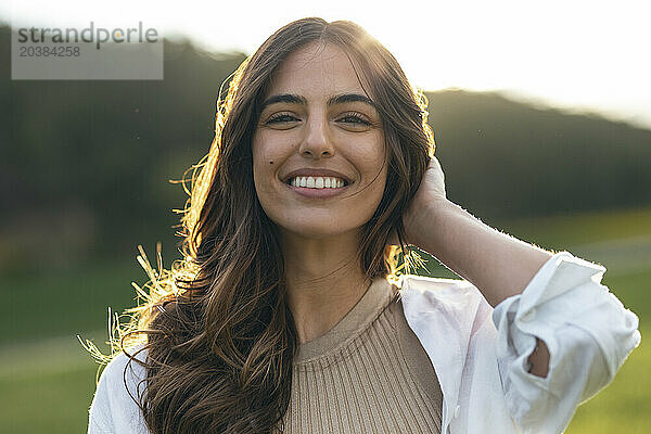 Smiling beautiful woman on sunny day