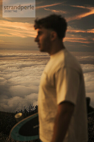 Man standing with clouds in background at Canary Islands