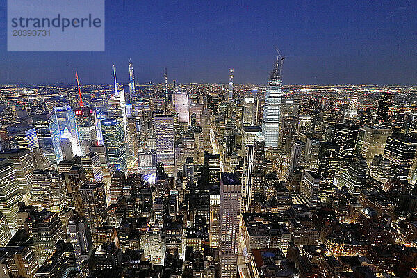 USA. New York City. Manhattan. Empire State Building. View from the top of the building at dusk and night. View to the north of the midtown Manhattan  in direction of Central Park.