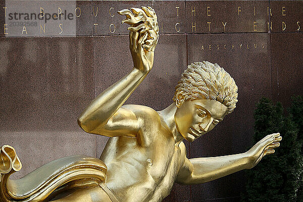 USA. New York City. Manhattan. Rockefeller Center during the winter. Statue Prometheus  by Paul Howard Manship (1885 ? 1966).