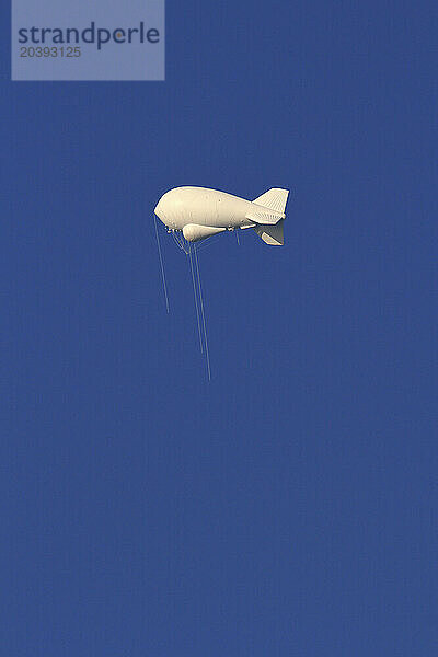 Usa  Florida  weather balloon in a blue sky.