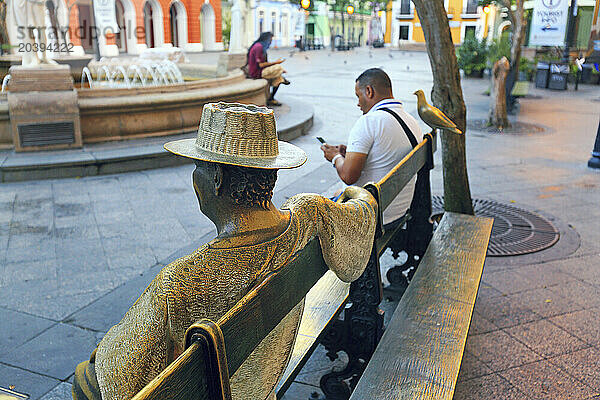 Usa  Porto Rico  San Juan. Statue of Puerto Rican composer Catalino ?Tite? Curet Alonso in the Plaza de Armas