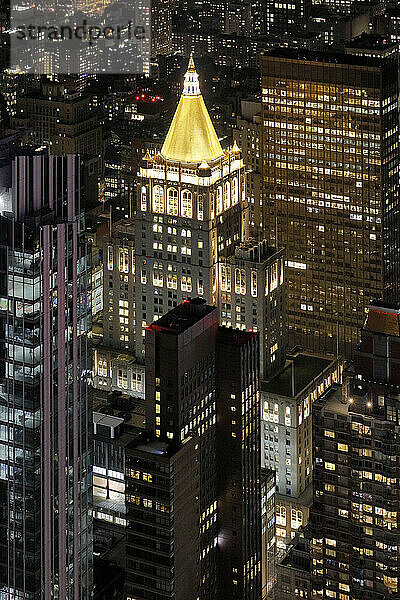 USA. New York City. Manhattan. Empire State Building. View from the top of the building at dusk and night  in direction of the south east and the Madison Square Park.