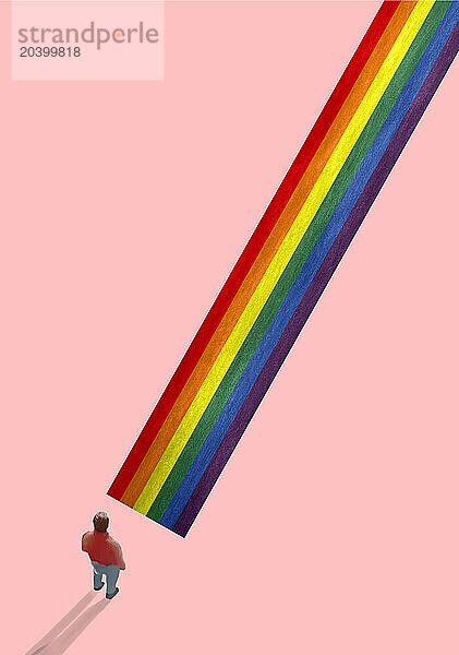 Illustration of man standing at LGBTQIA pathway on coral background