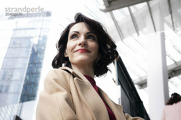 Confident businesswoman with red lipstick