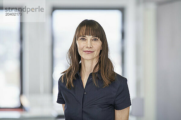 Portrait of confident businesswoman in office