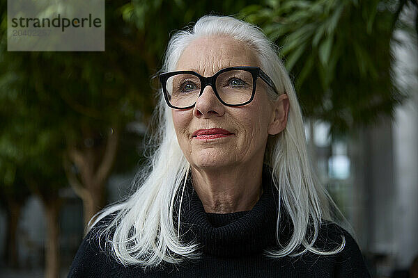 Lonely senior woman with white hair