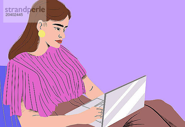 Focused woman working on laptop at home