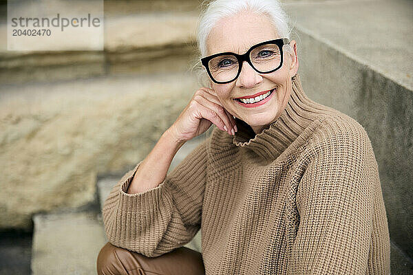 Happy senior woman with white hair