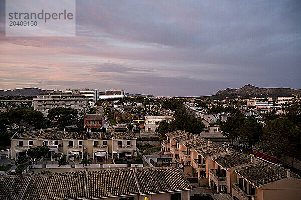 Apartments and holiday homes at sunset  Port d'Alcudia  Balearic Islands  Spain © Dosfotos/Axiom