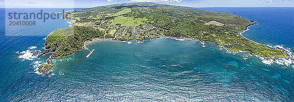 A panorama aerial look at Hana Bay on the northeast coast of Maui and the town of Hana  Maui  Hawaii. Twenty image files were combined for this panorama view.