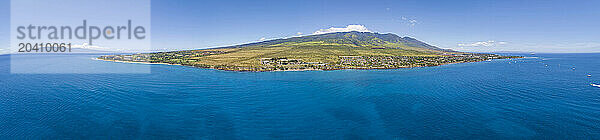 An aerial view of West Maui from Kaanapali Beach with Molokai in the background  to Lahaina harbor  Maui  Hawaii  USA.