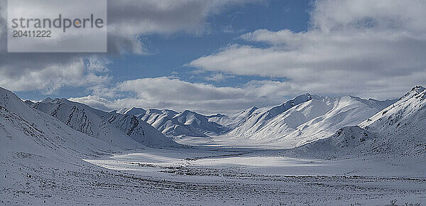 Winter covers the landscape in the Blackstone River Valley up on the Demptser Highway on the northern Yukon.