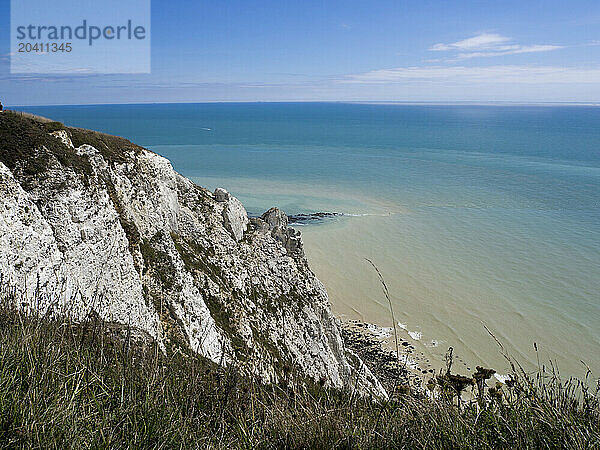 View of the English Channel and white cliffs from a coast path near Beachy Head  Eastbourne  East Sussex  UK © Renzo Frontoni