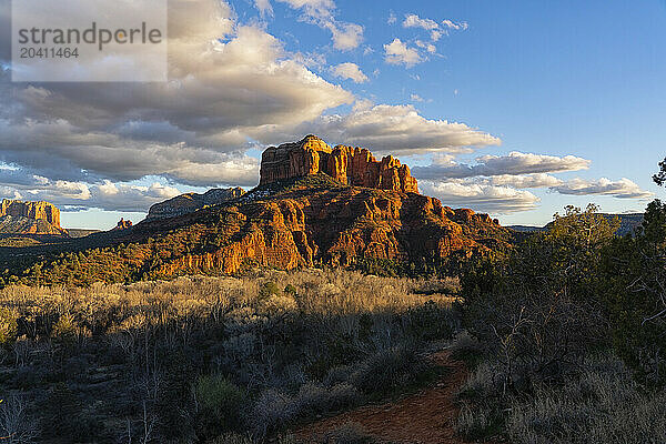 Sedona is located in the interior chaparral  semi-desert grassland  Great Basin conifer woodland biomes of northern Arizona. This is an example of the red rock that is very predominate oin the area. Many hiking trails are in the area to take in these amazing sights. This is the most iconic area known as Cathedral Rock.