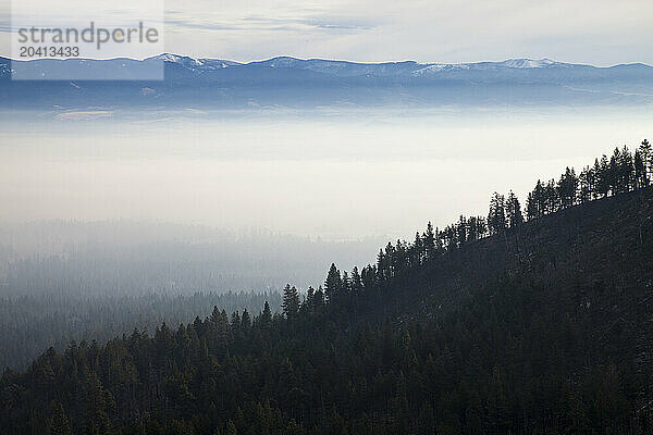 A smokey haze from Idaho Wildfires lies in the Bitterroot Valley on a Fall morning.