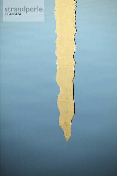 The Washington Memorial is reflected in the Lincoln Memorial Reflecting Pool.