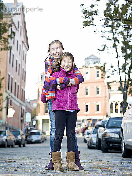 two girls in portland  me's old port