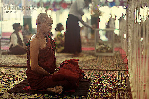 monks pray in temple