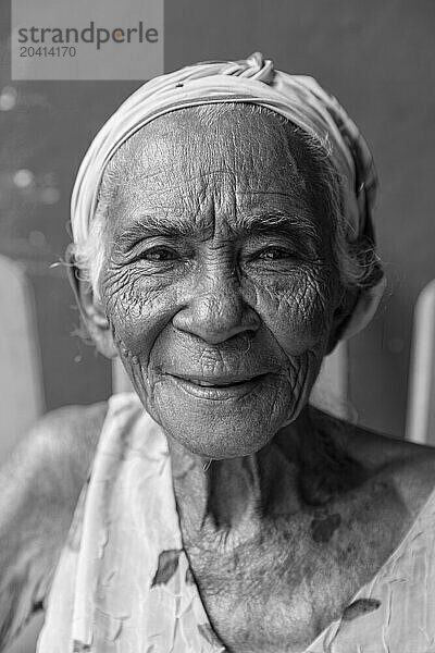 Portrait of senior woman wearing headscarf and smiling  Baracoa  Cuba