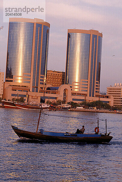 A water taxi cruises by  Dubai  United Arab Emirates.