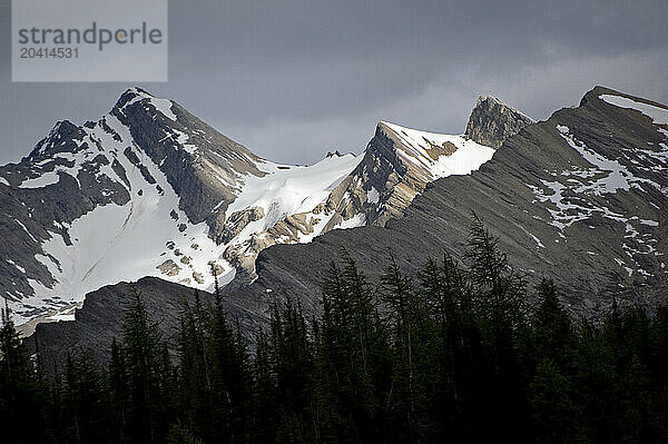 Peaks in stormy sunlight along the Sawback Ridge Trail in Banff NP  Alberta Canda on 7/22/2010