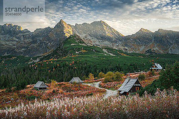 Sunrays Piercing Clouds over Huts in Dolina Gasienicowa Valley