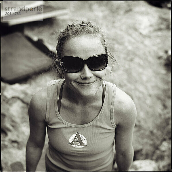 A rockclimber poses for a portrait at Hueco Tanks State Park  Texas