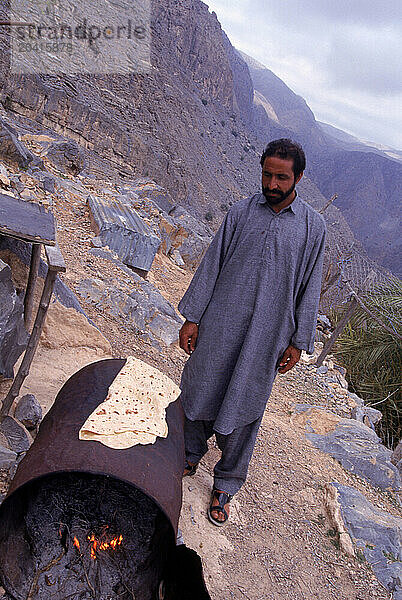 Man making bread  Dubai  United Arab Emirates.