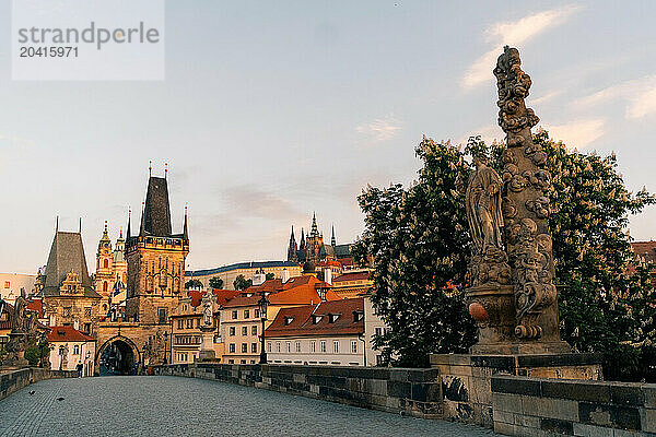 Dawn in spring on the Charles Bridge in Prague  towers  castles