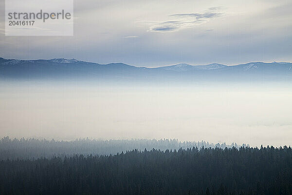 A smokey haze from Idaho Wildfires lies in the Bitterroot Valley on a Fall morning.