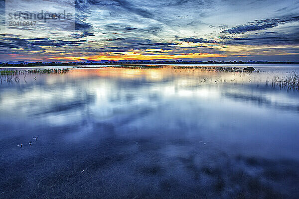 Sunset in Asia Sri Lanka  Polonnaruwa  a lake near the medieval capital city