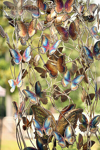 A metal butterfly sculpture at Airlie Gardens  in Wilmington  NC.