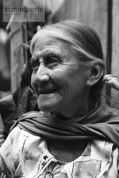 A woman looks off into the distance in the market town of Chichicastenango  Guatemala.