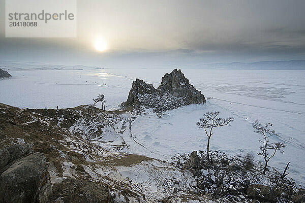 Rock formation at frozen Lake Baikal  Irkutsk Oblast  Siberia  Russia