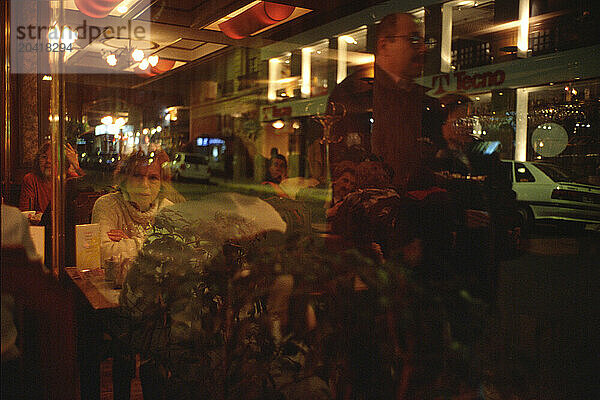 Diners relax on one of Buenos Aires' many cafes.