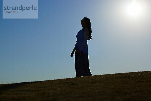 Japanese woman silhouette at sunset