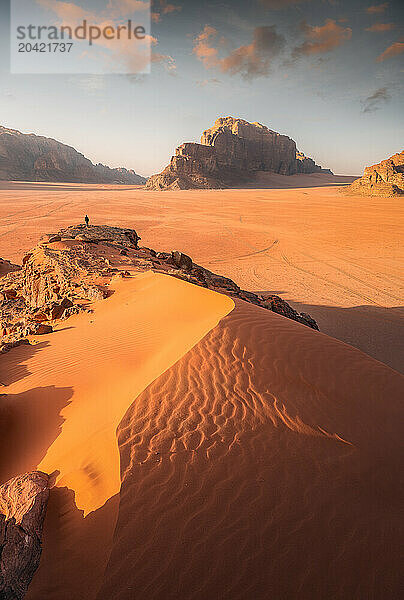 Towering Sand Dune Silhouetted at Sunset in Wadi Rum  Jordan