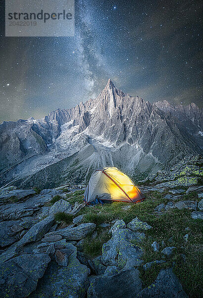 Drus Peak Beneath the Milky Way  with Tent Illuminated at Night