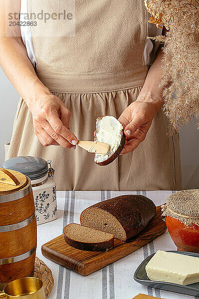 A girl can butter homemade bread