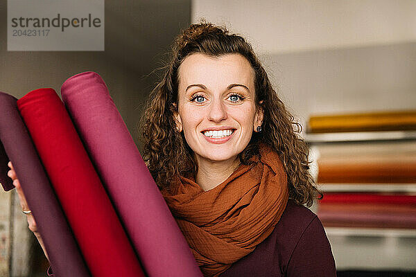 Joyful expression captured on a woman with curly hair